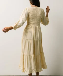 POL Dresses Tarryn Smocked Midi Dress | Light Yellow Floral